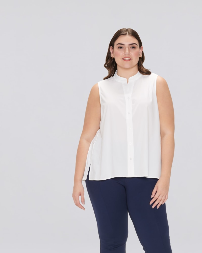 Front of a model wearing a size 4XL Gabby Sleeveless Pleated Back Top in White by Cotidié. | dia_product_style_image_id:299960